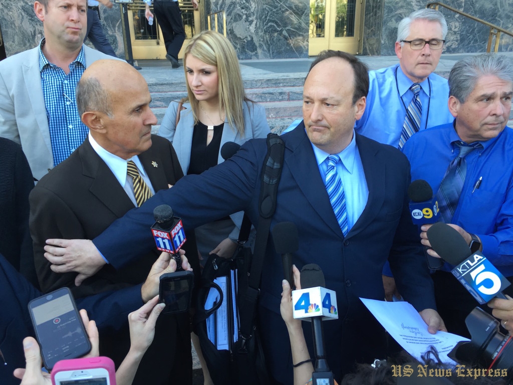 Lee Baca  (left)  and his attorney (right ).   photo by    keyang 